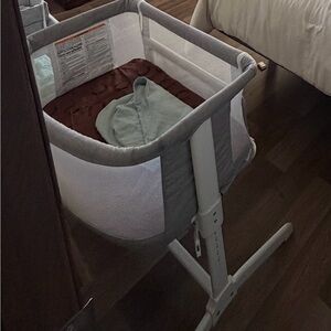 Gray and White Baby Bassinet